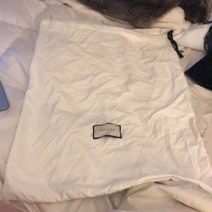 Tall Gucci drawstring dust bag